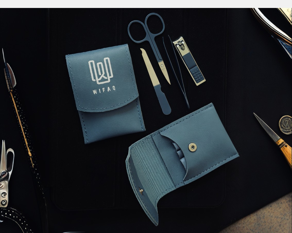 WIFAQ blue manicure pouches and grooming tools on a dark surface